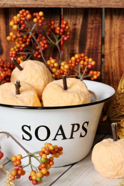 These quick and easy DIY pumpkin soaps are so cute and the perfect addition to your fall decor. They work great as cute little hostess gifts too! #falldecor #pumpkin