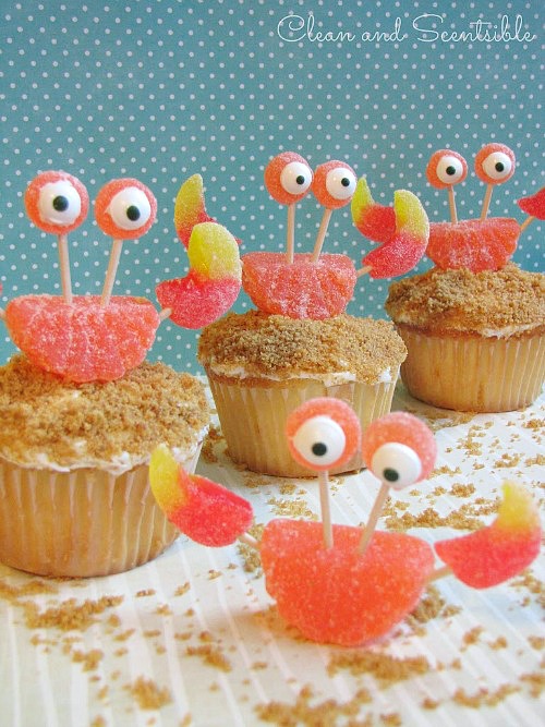 Cute crab cupcakes with graham cracker "sand" and gummy "crabs".