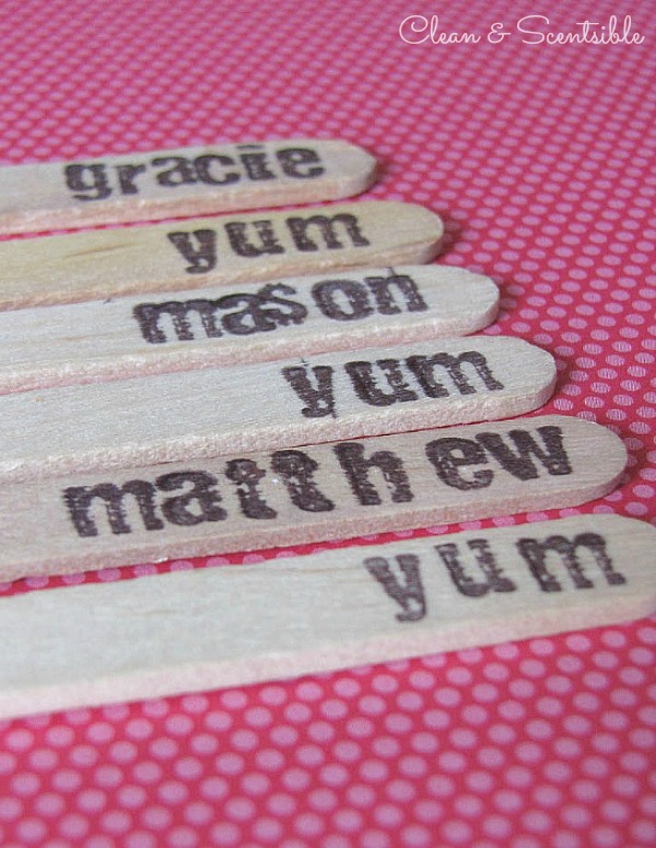 Stamp kids' names or words on popsicle sticks.
