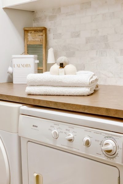 Laundry room with clean dryer.