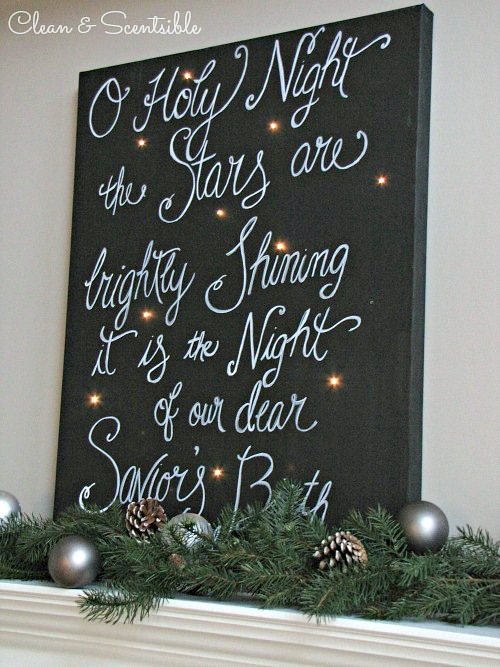 Create a beautiful holiday sign with a canvas and Christmas lights. So pretty!