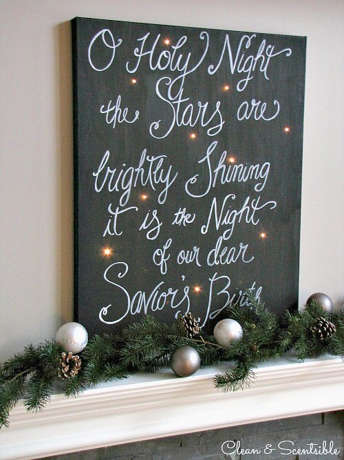 Create a beautiful holiday sign with a canvas and Christmas lights.