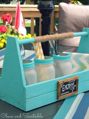 Cute picnic caddy with frosted mason jars. Could be used as a utensil holder, candle holder, planter, and more!