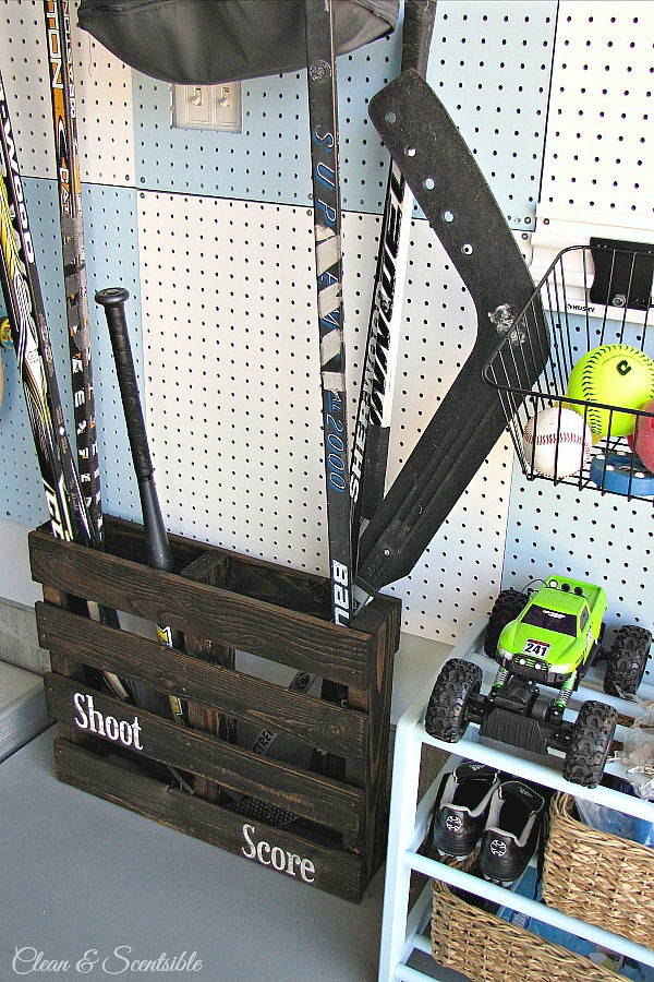 Turn an old pallet into sports equipment storage!  // cleanandscentsible.com