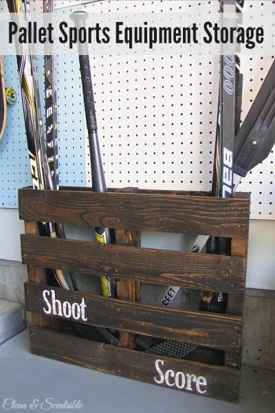 Turn an old pallet into sports equipment storage! Pefect for hockey sticks, baseball bats, etc. // cleanandscentsible.com