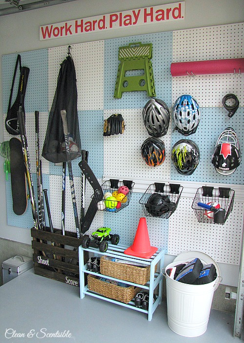 DIY pegboard wall organizer used for organizing sports equipment.