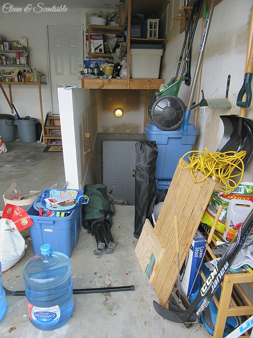 Before pictures of a messy garage space before it was cleaned and organized.