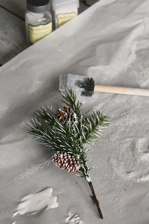 Make your own snow covered branches and pine cones to use for Christmas vignettes and displays. So much prettier! // cleanandscentsible.com
