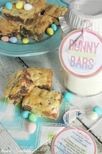 Delicious mini egg dessert bars on a plate and a Bunny Bars tag to create mini-egg dessert bars in a jar hostess gifts.