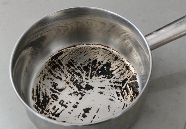 Great tips to remove burnt on food from stainless steel pots - works on cookie sheets and other baking items too!