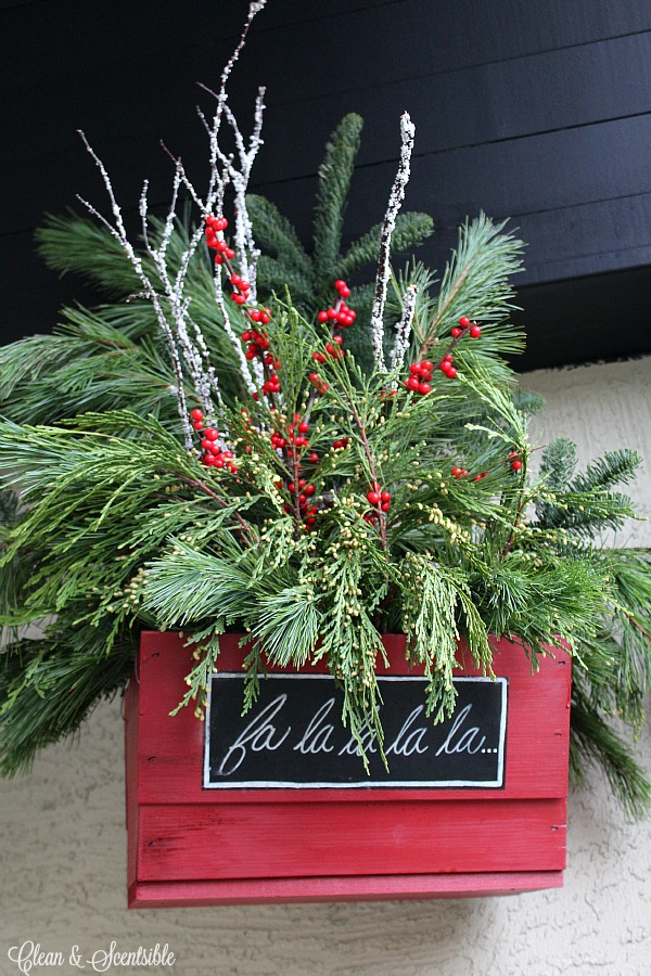 Rustic Christmas front porch with lots of decorating ideas and DIY tutorials.