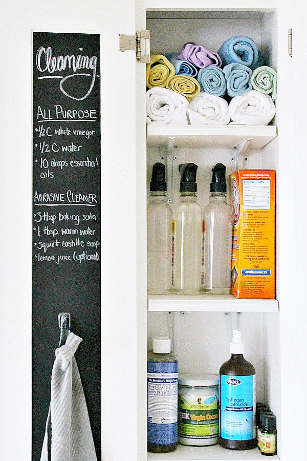 Organized cleaning supply closet.