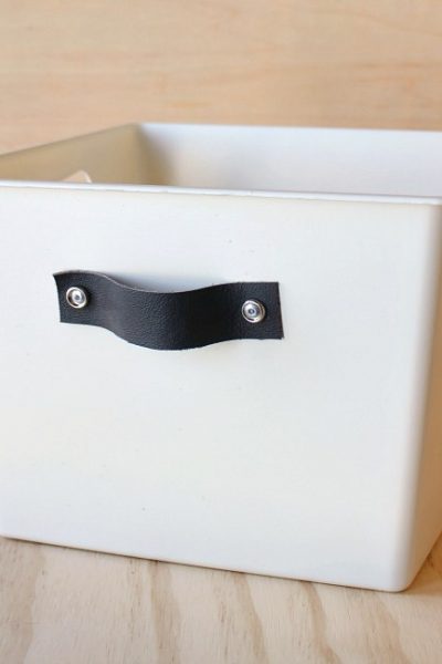 Dress up those boring dollar store bins with this easy tutorial for stylish DIY storage totes.