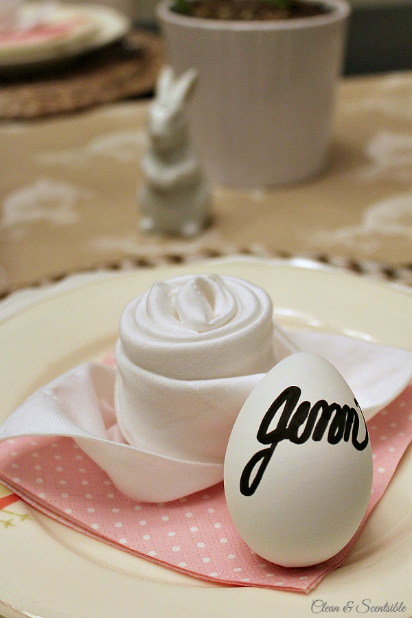 Egg name cards using faux eggs. Cute idea for Easter dinner!