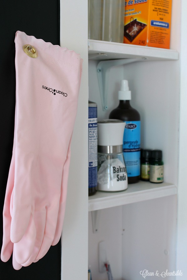 This is so smart! Add some grommets to your cleaning gloves or cleaning cloths so they can easily be hung up.