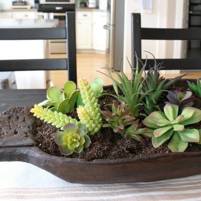 Quick and easy succulent planter in a dough bowl. You can't even tell that these are faux!