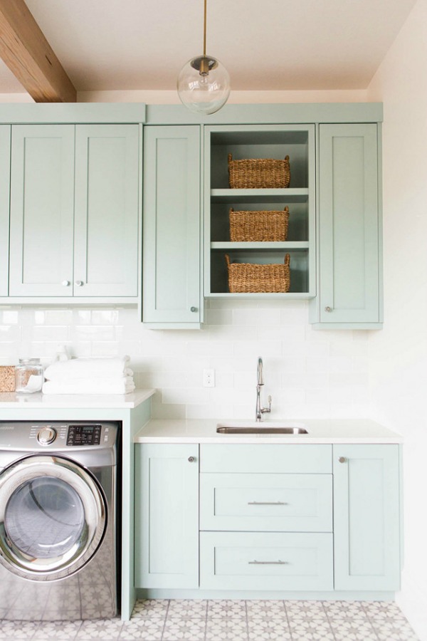 Tips, design inspiration, and free printables to help you organize the laundry room.