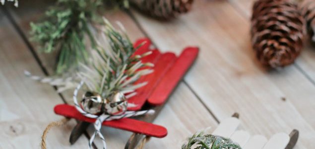 Popsicle stick sleds. These easy handmade Christmas ornaments can be dressed up or done as a simple kids Christmas craft.