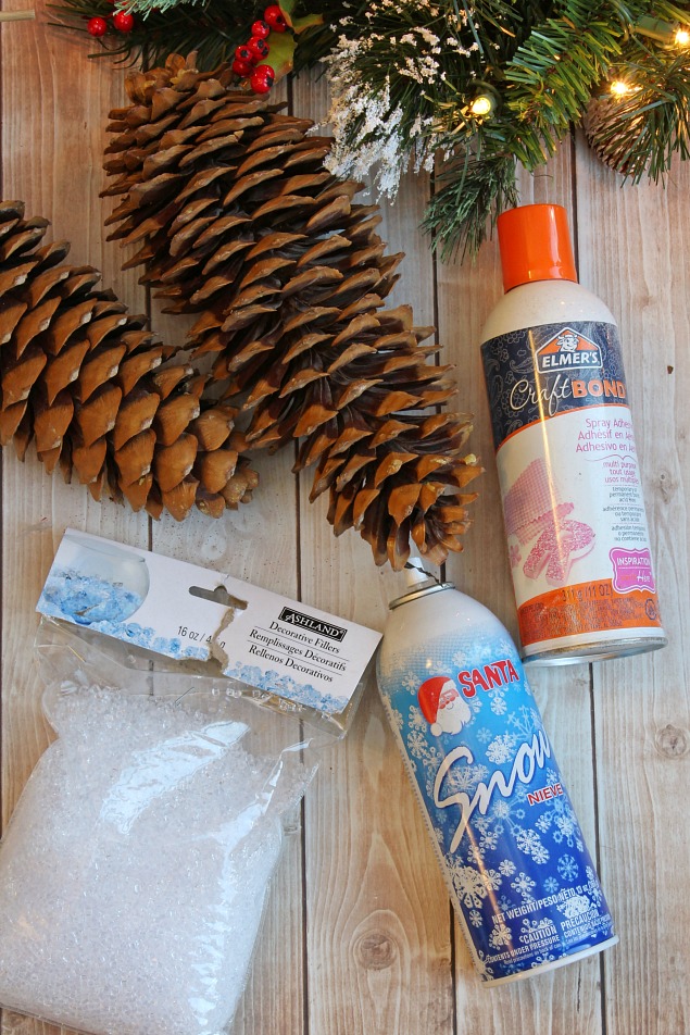 DIY icicle pinecones. All you need is a few supplies and 10 minutes to create these pretty snowy pinecones.