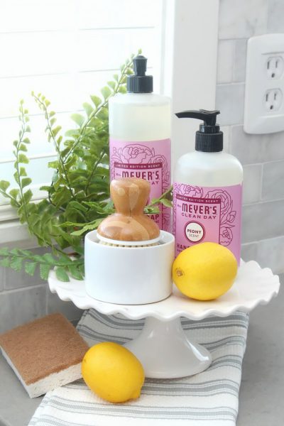 Spring cleaning supplies and spring cleaning tips. This is a pretty way to display dish soap and hand soap.