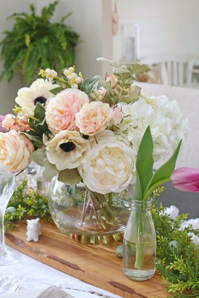 Beautiful spring centerpiece with faux flowers.