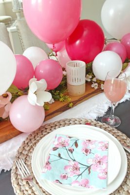 Such a pretty balloon centerpiece! This floral arrangement is perfect for Mother's Day or a baby shower or switch up the colors and layers for any themed party!