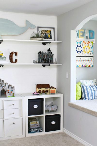 Kids Bedroom Organization. Reading nook and Ikea storage unit to keep toys organized.