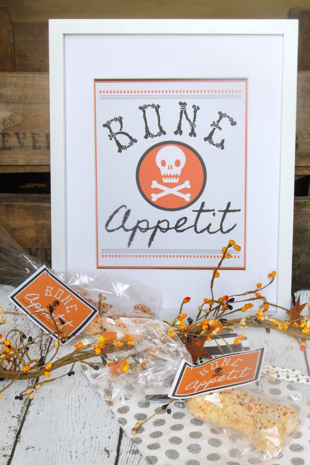 Bone Appetit free Halloween printable displayed in a frame with smaller bag toppers in front.