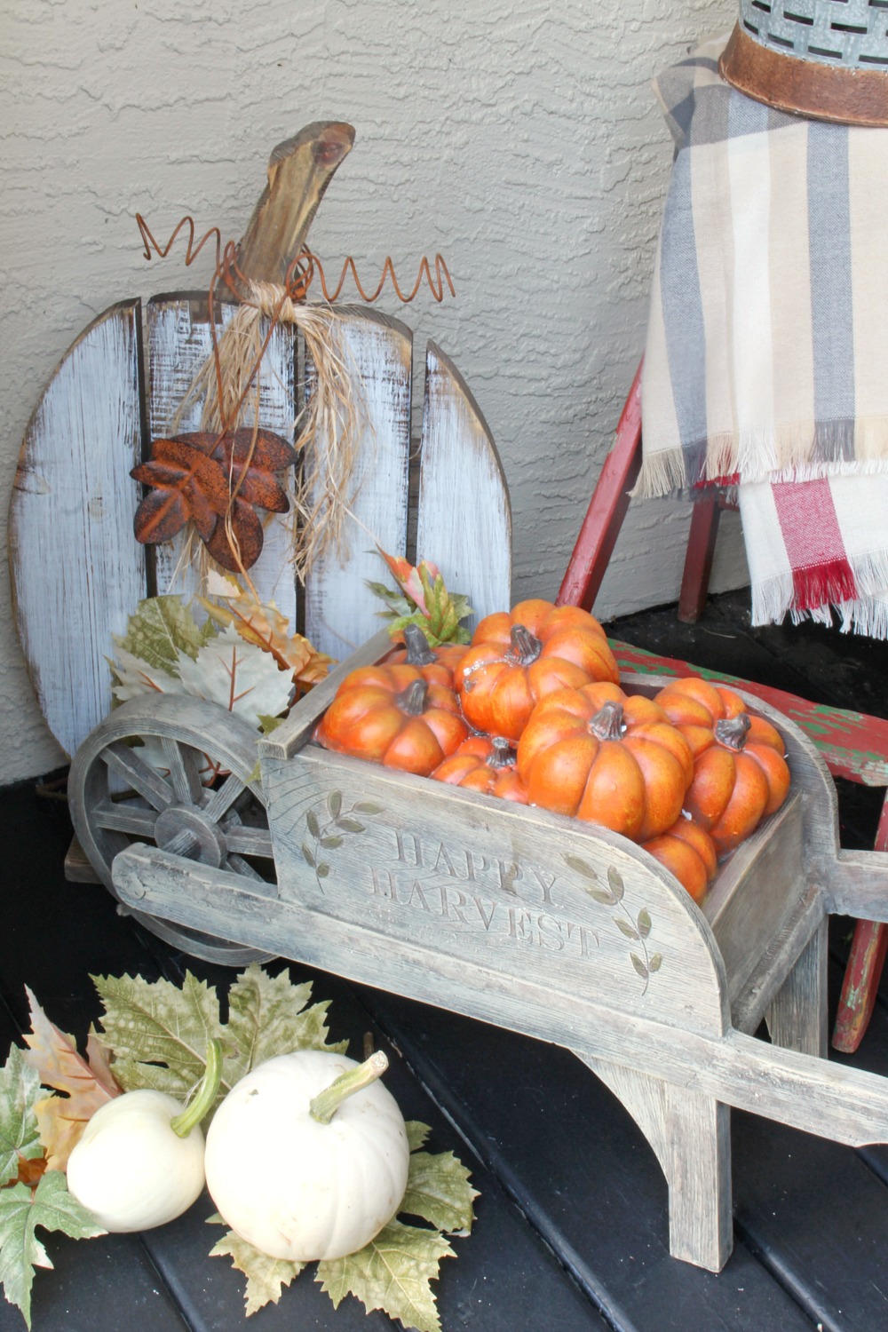 Colorful fall front porch decorating ideas. Rustic farmhouse style.