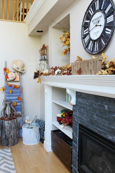 Family Room Fall Decorating Ideas. Easy fall decorations in traditional autumn colors with pops of blue.