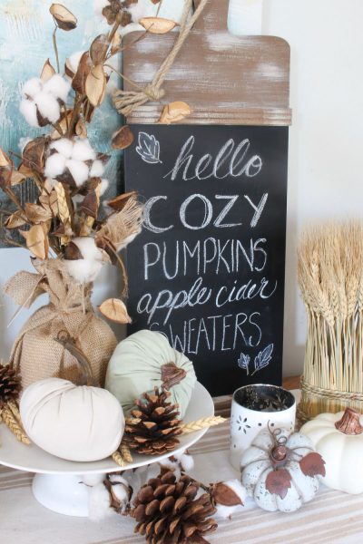 Fall dining room home tour. This farmstyle dining room is decorated in non-traditional fall colors with pops of blue and yellow.