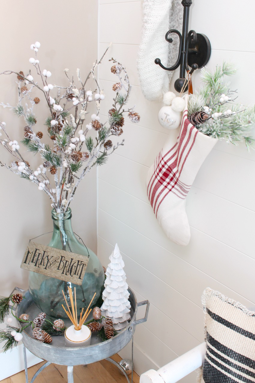 Christmas Front Entry Decorating Ideas. Pretty and simple ideas to dress up your front entry for the holidays. Love the red and white farmhouse feel!