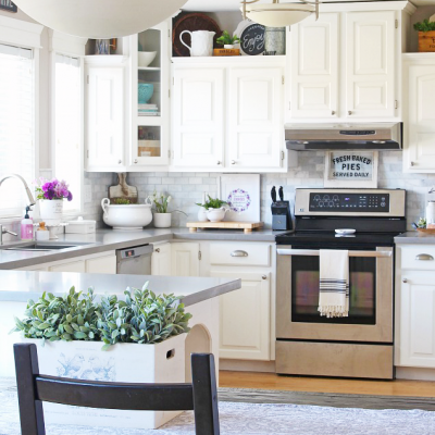 White farmhouse style kitchen with quartz countertops.