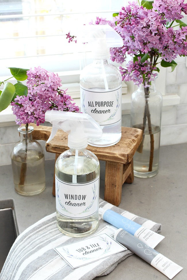 Glass spray bottles with free printable cleaning labels.