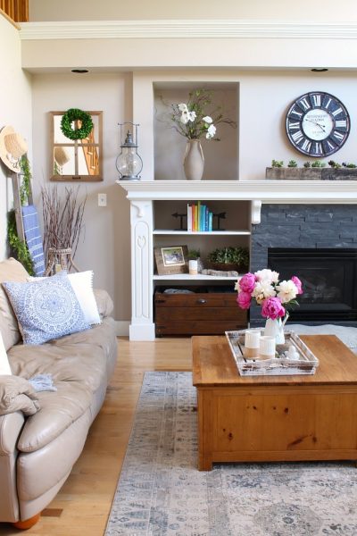 Pretty farmhouse style family room with pink peonies.
