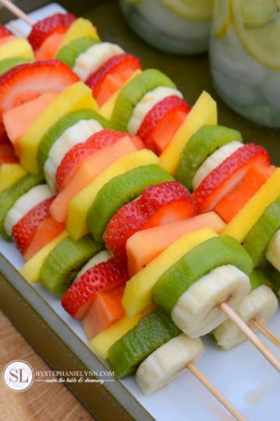 Colorful fruit kabobs for summer parties.