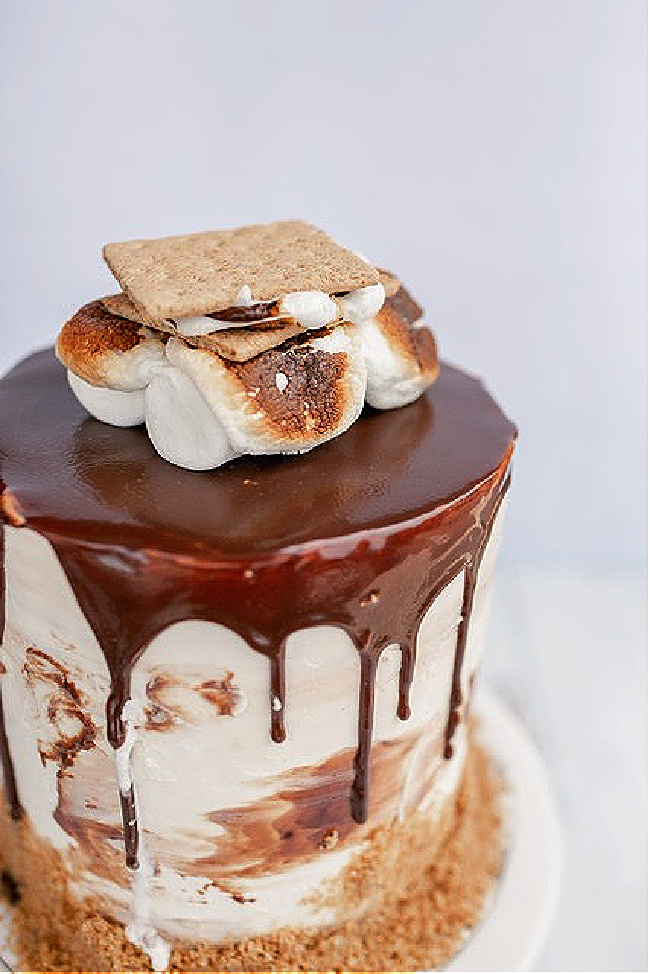 S'mores cake with toasted marshmallow topping.