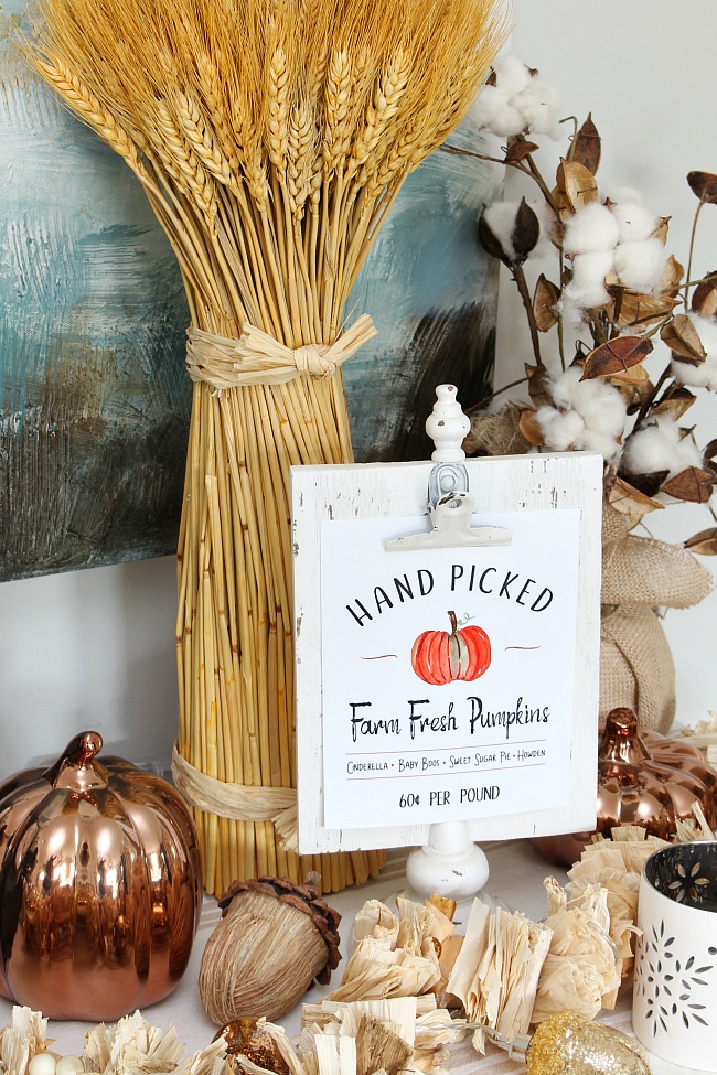 Hand picked farm fresh pumpkins printable on a sideboard decorated for fall.