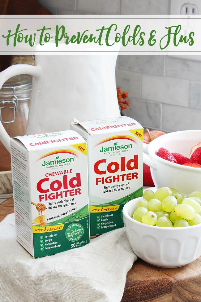 How to prevent colds and flus. Jamieson cold fighter supplements with bowls of grapes and strawberries.