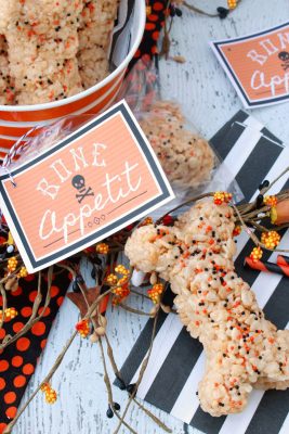 Rice Krispie treats shaped as bones for a Halloween treat with Bone Appetit Halloween gift tag.