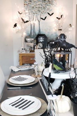 Halloween decor ideas. Halloween table decorated with black and white Halloween decor.