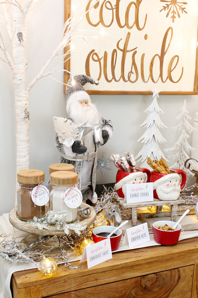 Cute Christmas hot chocolate bar on a side bar. Free printable hot chocolate bar labels included.
