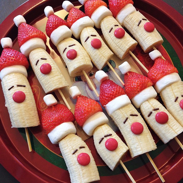 Santa fruit skewers using bananas, strawberries, and marshmallows.