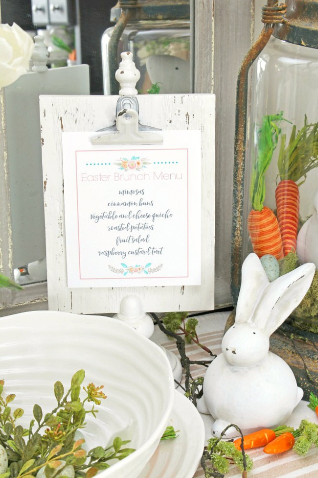 Free printable Easter brunch menu displayed on a clipboard frame.