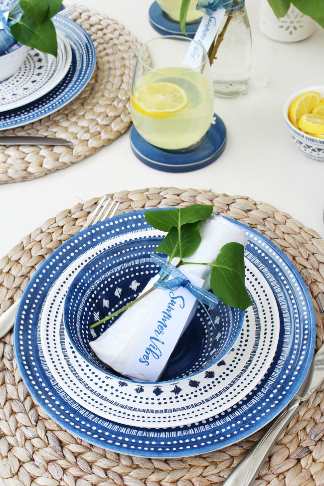 Pretty summer tablescape with navy, whites, and fresh greenery. Summer vibes free printable tags for the place settings or vases.