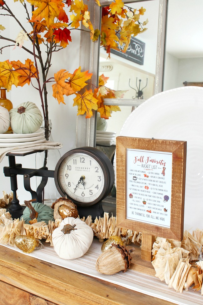 Fall favorites fall bucket list displayed in a wood frame.