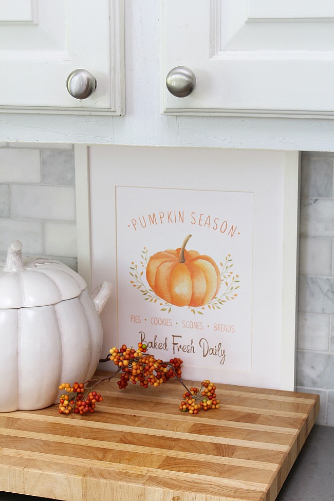 Farmhouse style 'Pumpkin Season' free fall printable displayed in a frame.