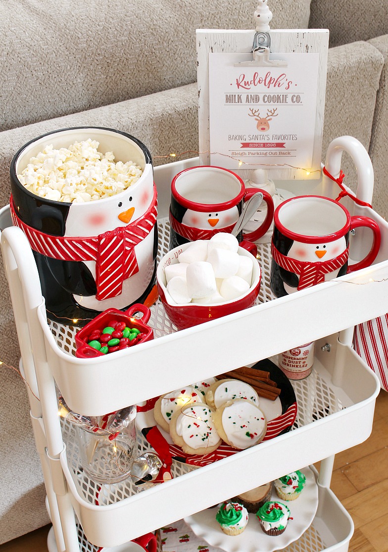 Christmas movie nightcart with popcorn, hot chocolate and Christmas treats.