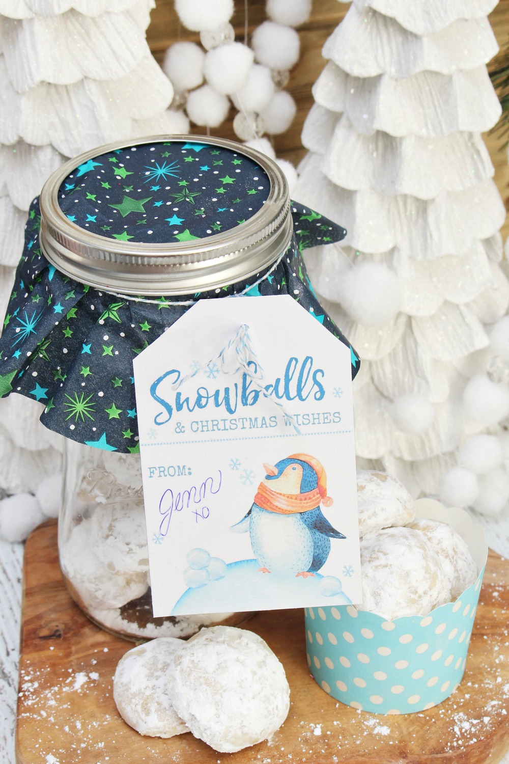Snowball cookies on a tray and wrapped up in a mason jar gift.