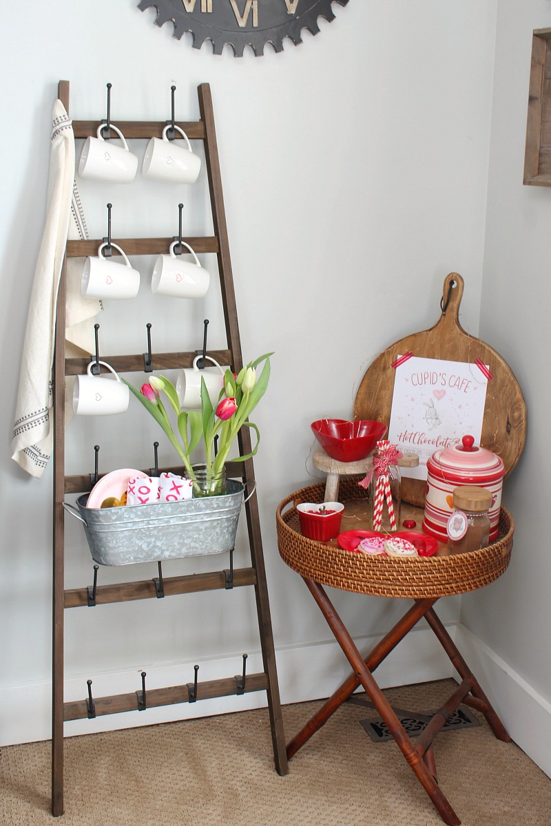Adorable hot chocolate bar idea with free Cupid's Cafe printable.